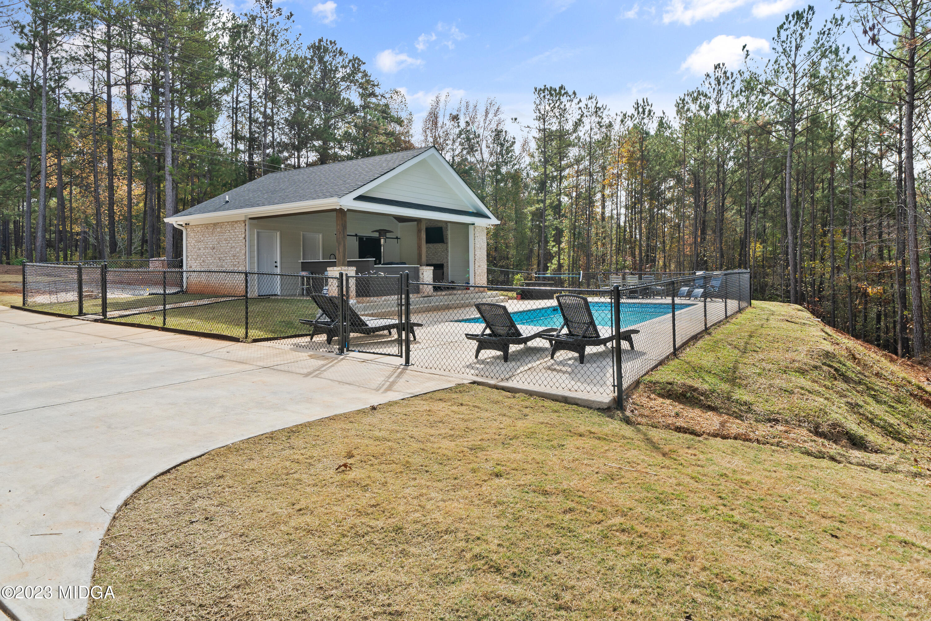 556 Pea Ridge Road Juliette, GA 31046 - Photo 30 of 42 a view of swimming pool with sitting area and furniture