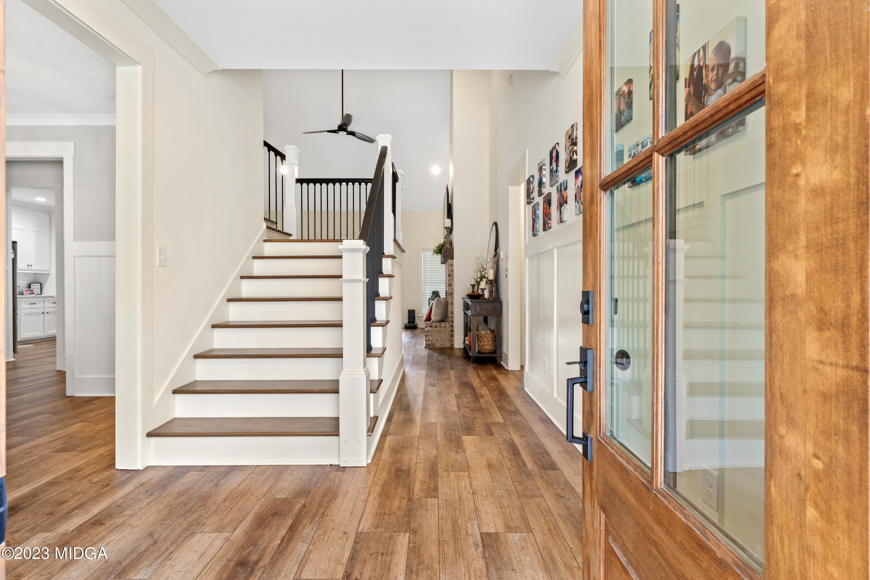 556 Pea Ridge Road Juliette, GA 31046 - Photo 4 of 42 a view of a hallway with wooden floor and staircase