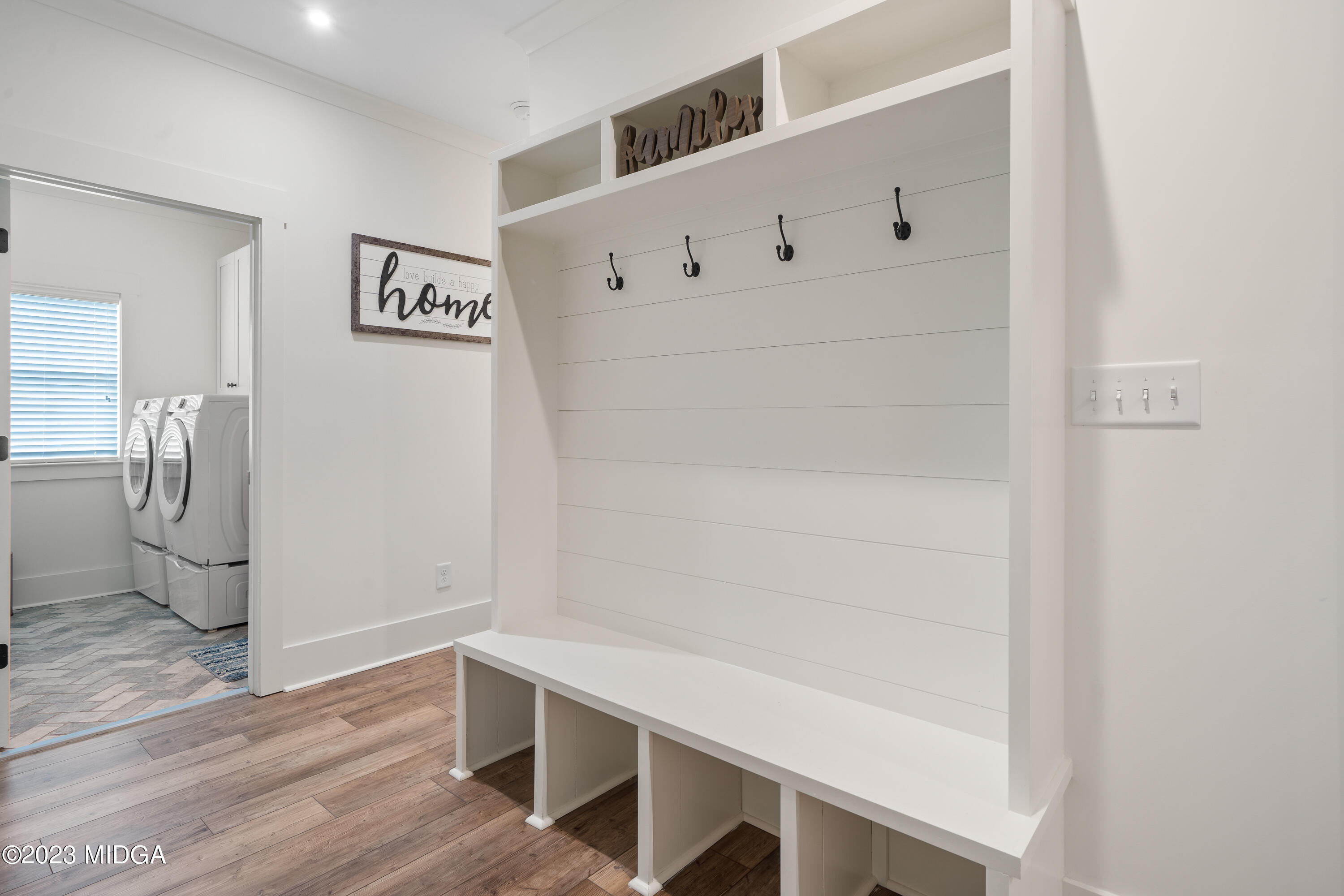 556 Pea Ridge Road Juliette, GA 31046 - Photo 41 of 42 a room with wooden floor and white walls