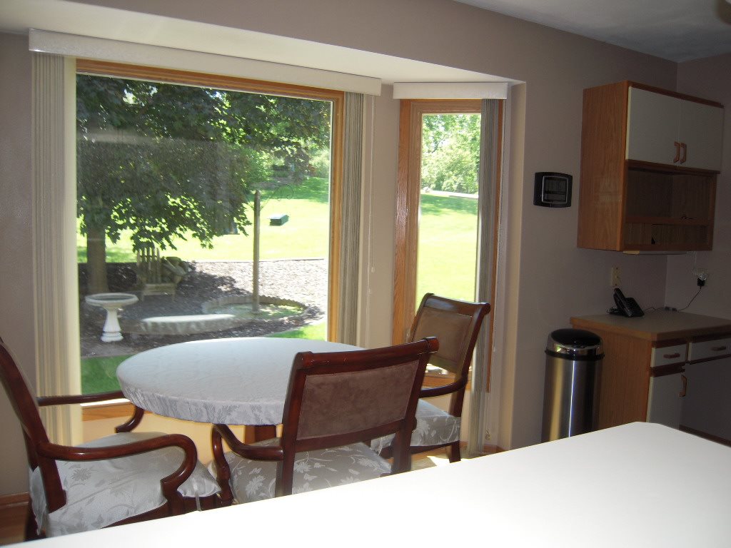 10409 Atwood Road Roscoe, IL 61073 - Photo 11 of 19 a view of a dining room with furniture window and outside view