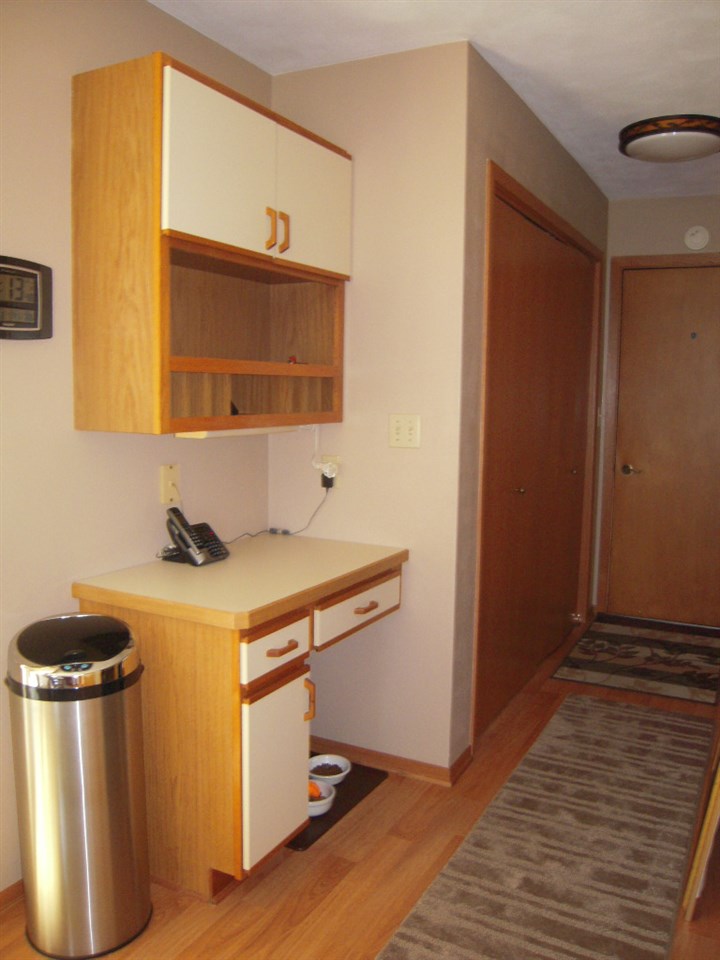 10409 Atwood Road Roscoe, IL 61073 - Photo 12 of 19 a kitchen with a stove and a refrigerator