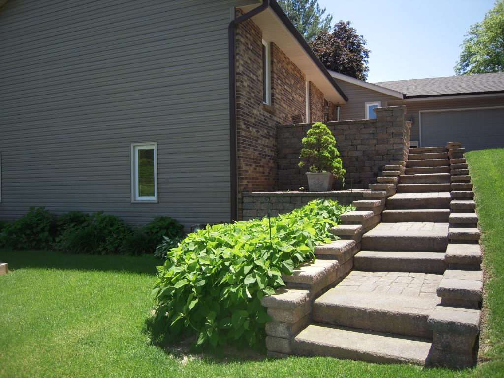 10409 Atwood Road Roscoe, IL 61073 - Photo 2 of 19 a view of a garden with pathway