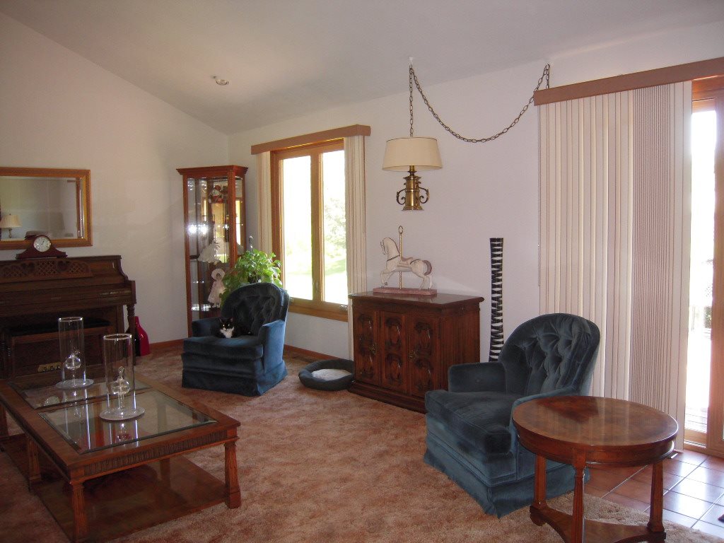 10409 Atwood Road Roscoe, IL 61073 - Photo 4 of 19 a living room with furniture and a window