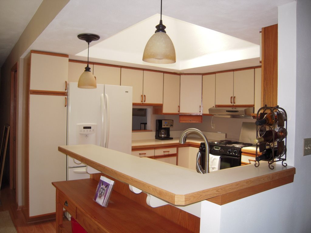 10409 Atwood Road Roscoe, IL 61073 - Photo 9 of 19 a kitchen with stainless steel appliances a sink stove and refrigerator