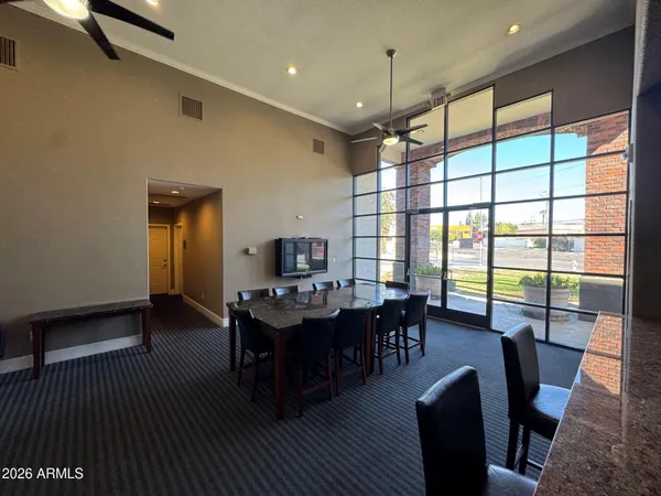 a view of a dining room with furniture window and wooden floor
