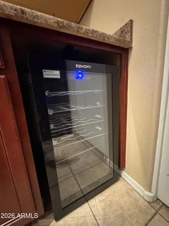 a refrigerator freezer sitting inside of a kitchen