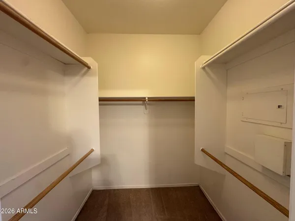 a view of an empty walk in closet