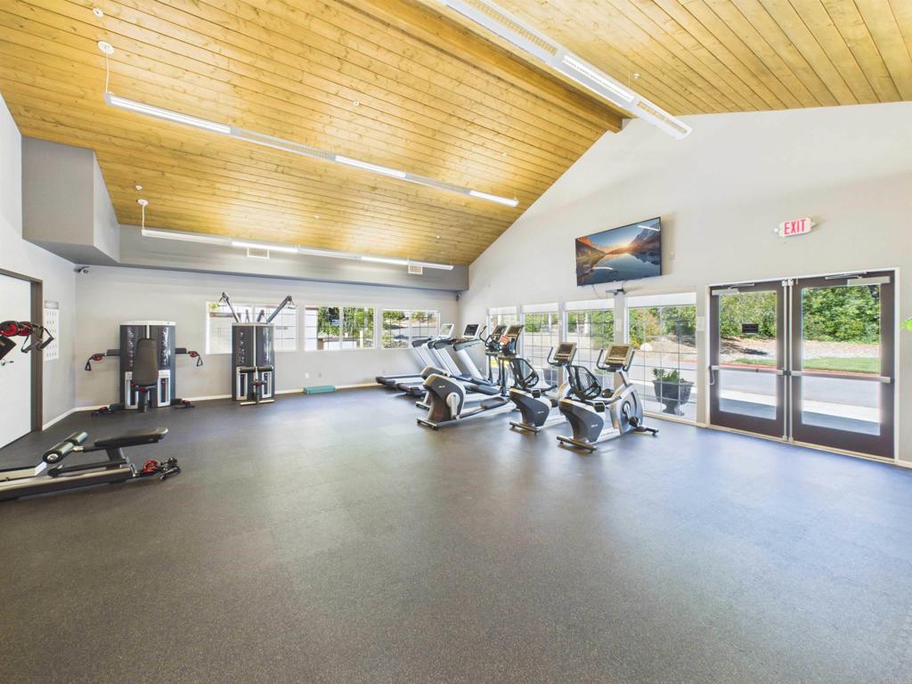 18218 Paradise Mountain Road, Unit 220 Valley Center, CA 92082 - Photo 20 of 48 a view of a room with gym equipment