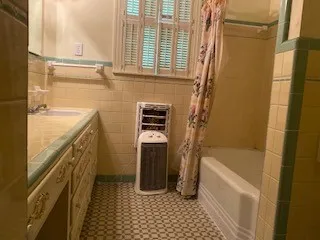 an empty room with closet and wooden door