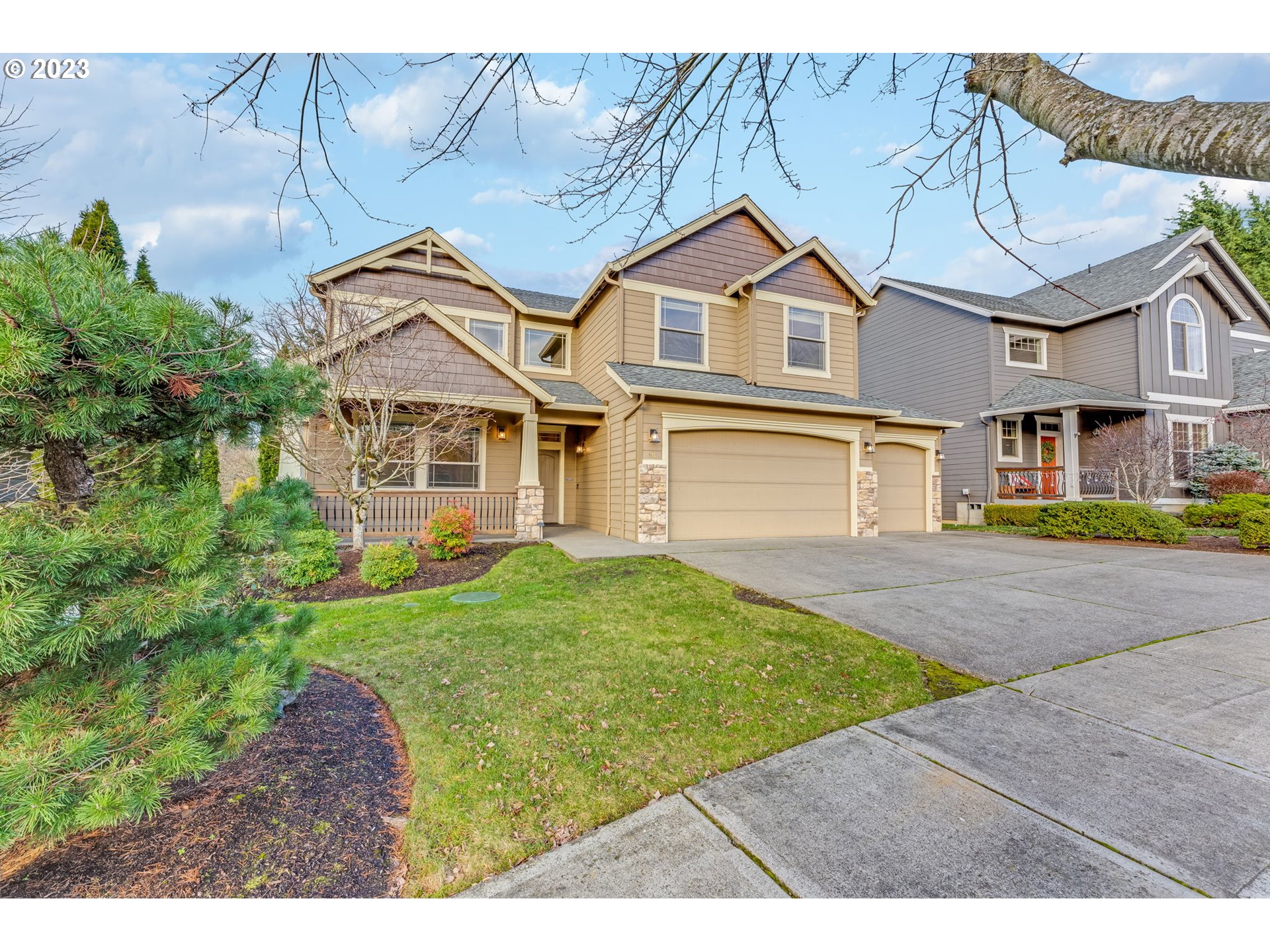 841 Northwest Sacajawea Place Camas, WA 98607 - Photo 2 of 48 a view of a yard in front of a house