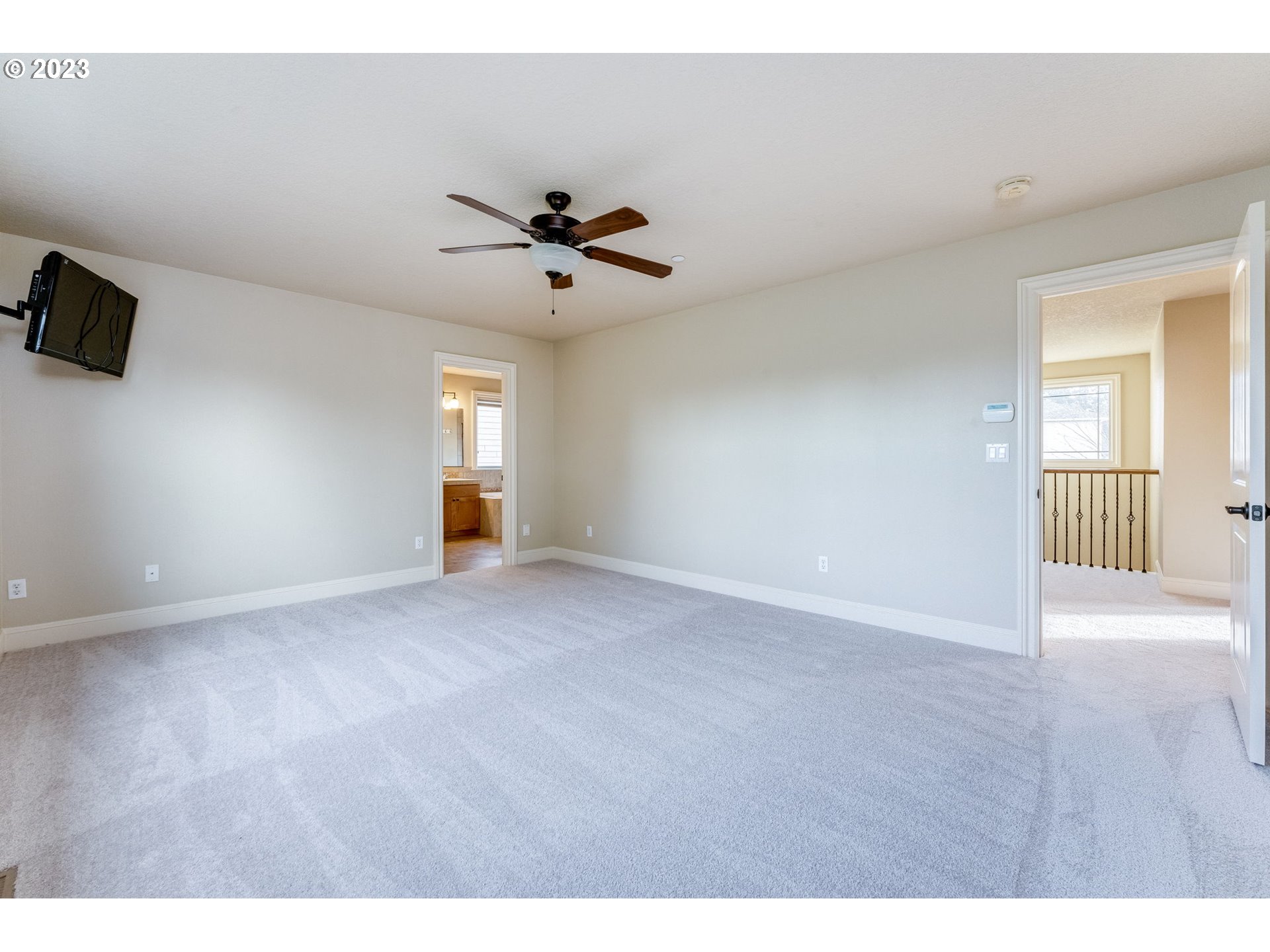 841 Northwest Sacajawea Place Camas, WA 98607 - Photo 27 of 48 a view of an empty room with a window and a kitchen
