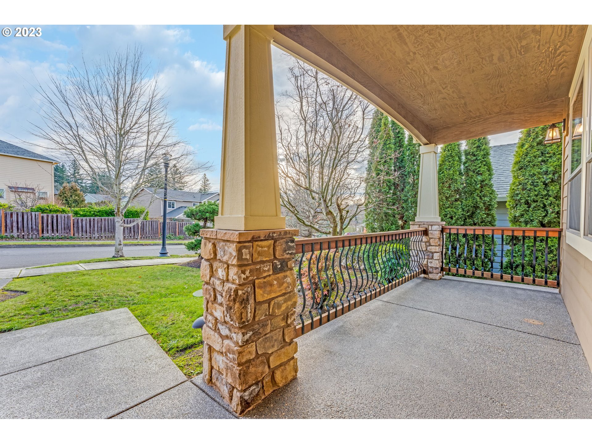 841 Northwest Sacajawea Place Camas, WA 98607 - Photo 4 of 48 a view of a street with a large window and wooden fence
