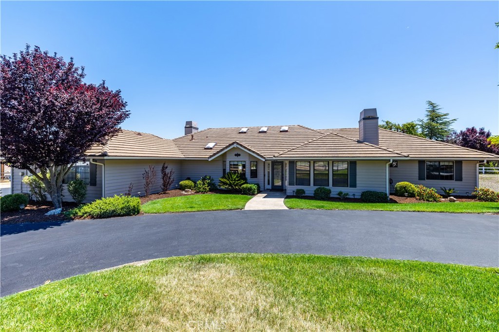 1275 Shane Lane Templeton, CA 93465 - Photo 6 of 70 a front view of a house with a yard and potted plants