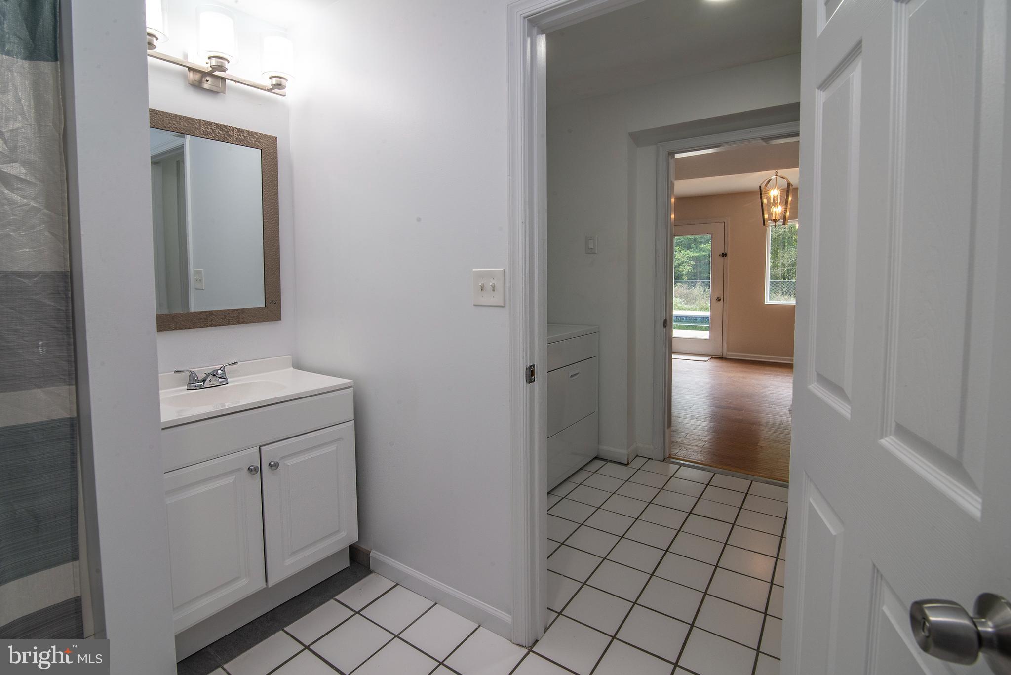 4748 Dickerson Road Partlow, VA 22534 - Photo 21 of 40 Main bathroom with ceramic tile