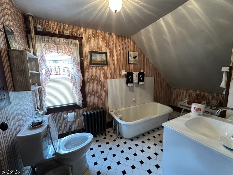 13 Cemetery Road Great Meadows, NJ 07838 - Photo 15 of 20 a bathroom with a sink a toilet a mirror and shower