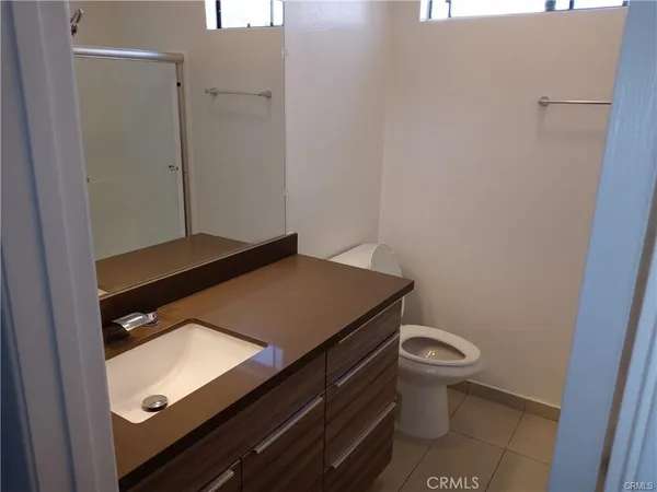 a bathroom with a sink and a toilet