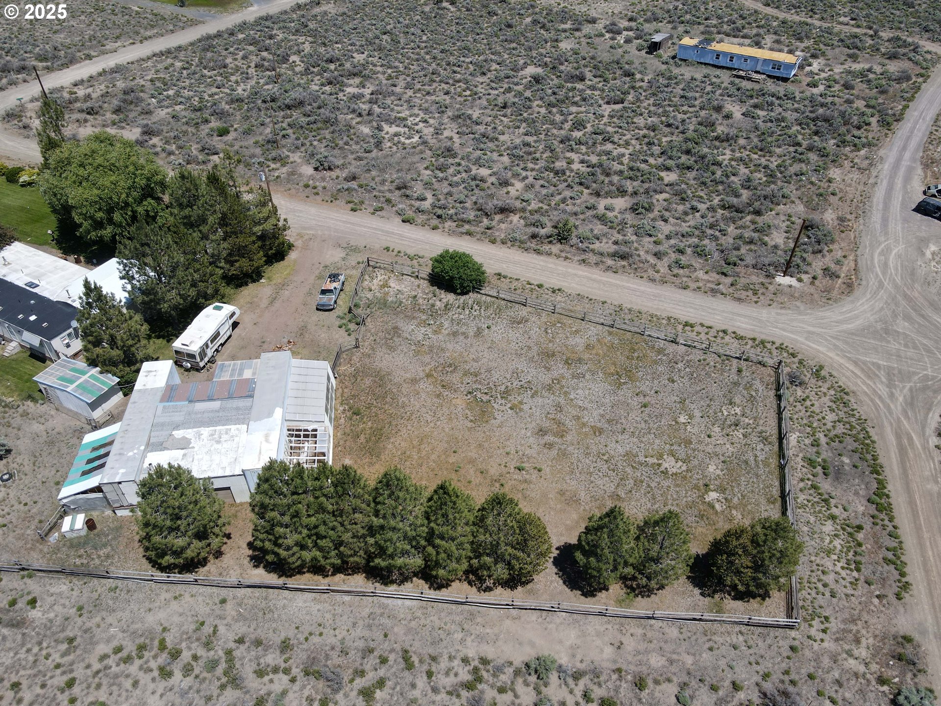 57580 Fall Road Christmas Valley, OR 97641 - Photo 19 of 38 a view of a garden with a pathway