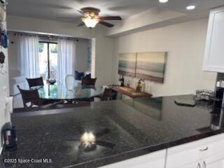 3245 Beach View Way Melbourne Beach, FL 32951 - Photo 6 of 21 a view of a living room and dining room