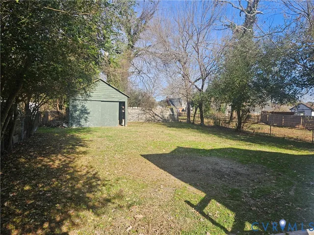 a view of yard with tree s