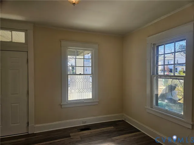 an empty room with windows