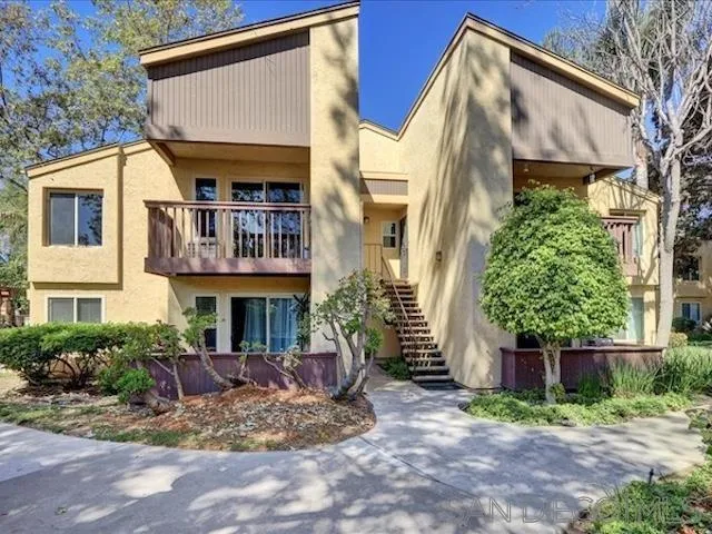 5978 Rancho Mission Road, Unit 264 San Diego, CA 92108 - Photo 1 of 22 a view of house with a yard and sitting area