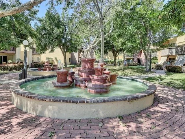 5978 Rancho Mission Road, Unit 264 San Diego, CA 92108 - Photo 15 of 22 a view of a house with garden and trees