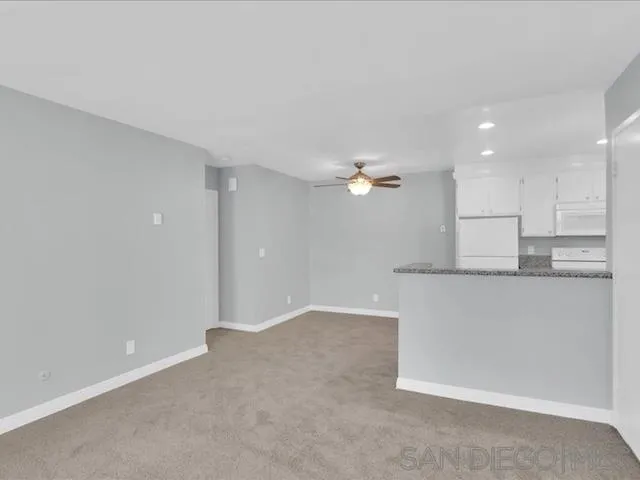 5978 Rancho Mission Road, Unit 264 San Diego, CA 92108 - Photo 2 of 22 a view of a kitchen with marble kitchen and kitchen