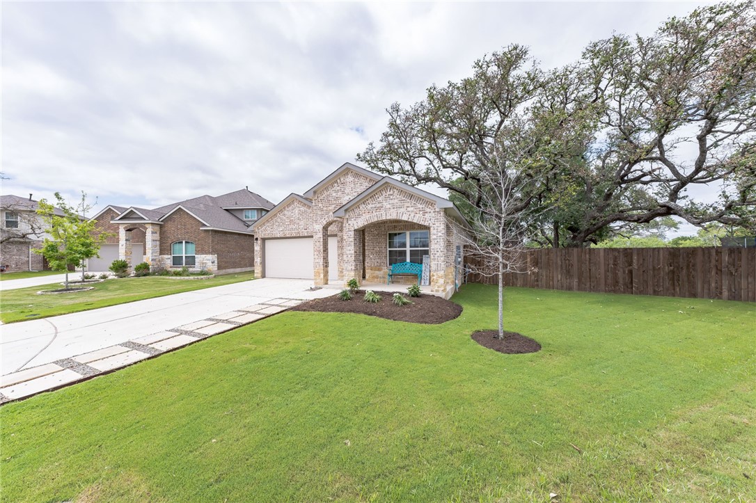 2540 Buffalo Ford Court Georgetown, TX 78628 - Photo 1 of 1 a view of a house with backyard and sitting area
