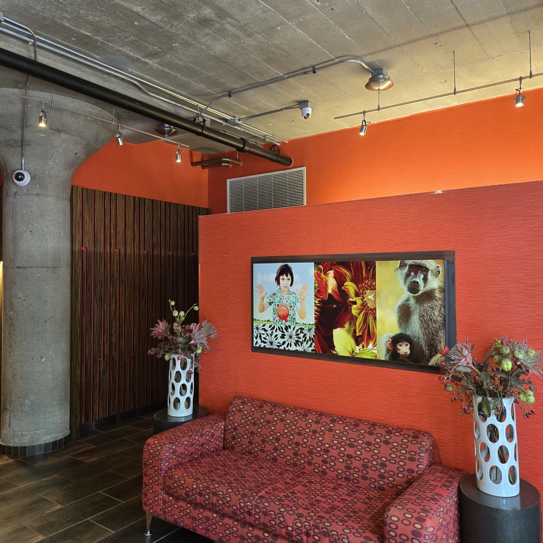 1111 West 15th Street, Unit 228 Chicago, IL 60608 - Photo 3 of 32 a blue sign that is sitting in front of a building