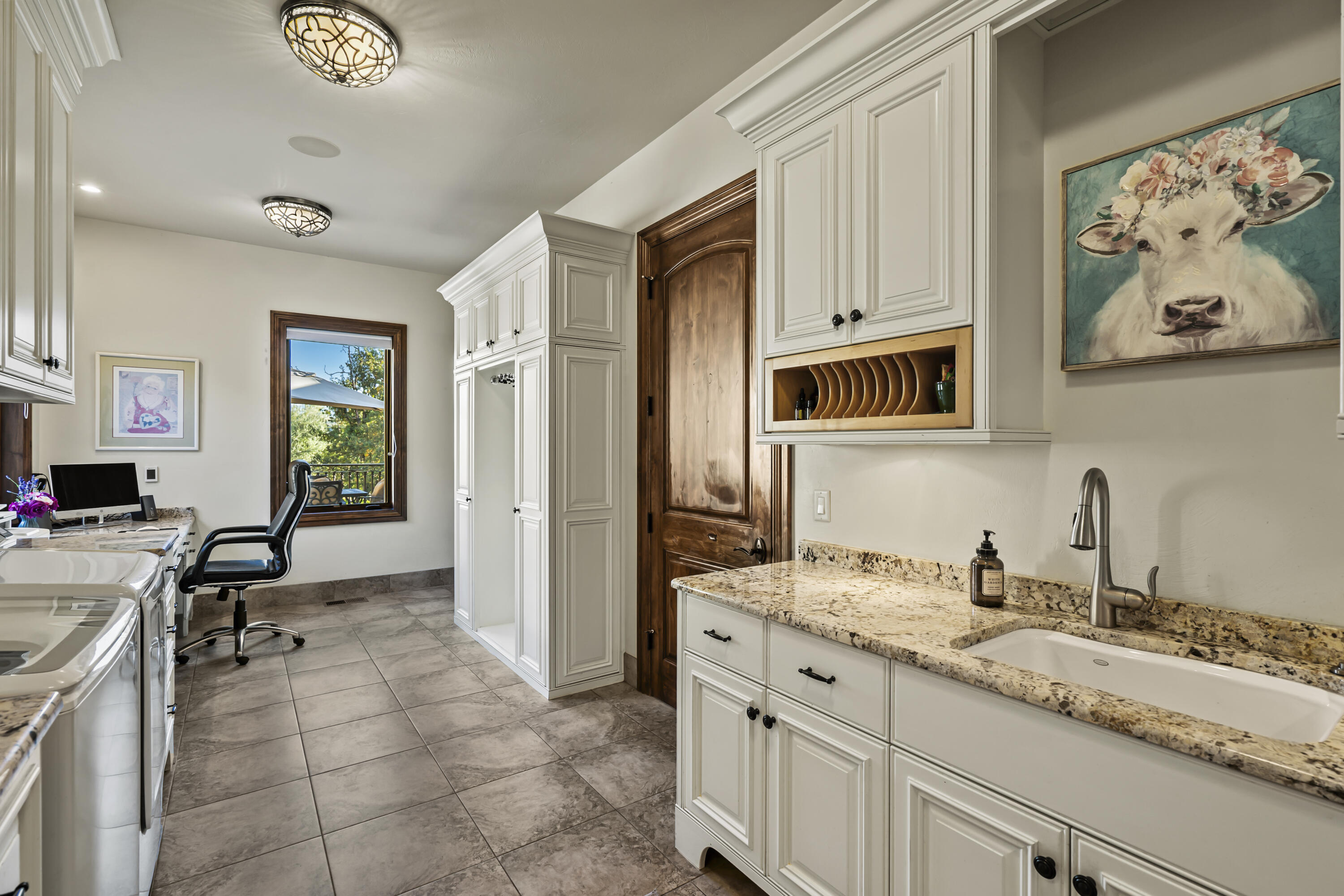 766 Meridian Road Eagle Point, OR 97524 - Photo 43 of 66 a spacious bathroom with a granite countertop sink a mirror a vanity and a shower