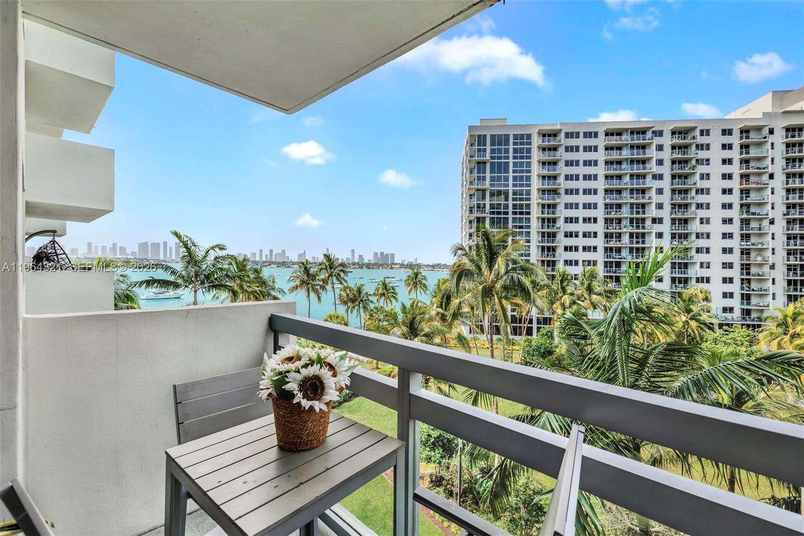 1500 Bay Road, Unit 544S Miami Beach, FL 33139 - Photo 1 of 32 a view of balcony with couple of potted plants