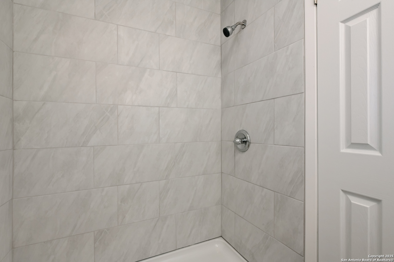 1044 Richmond Drive Schertz, TX 78154 - Photo 13 of 23 a bathroom with a shower