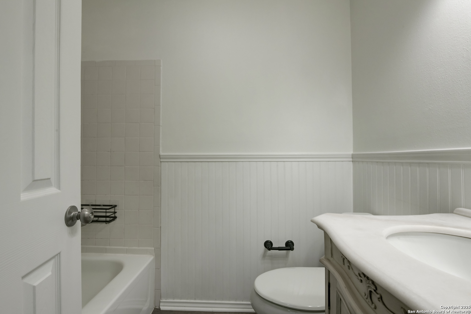 1044 Richmond Drive Schertz, TX 78154 - Photo 18 of 23 a bathroom with a sink a toilet and tub