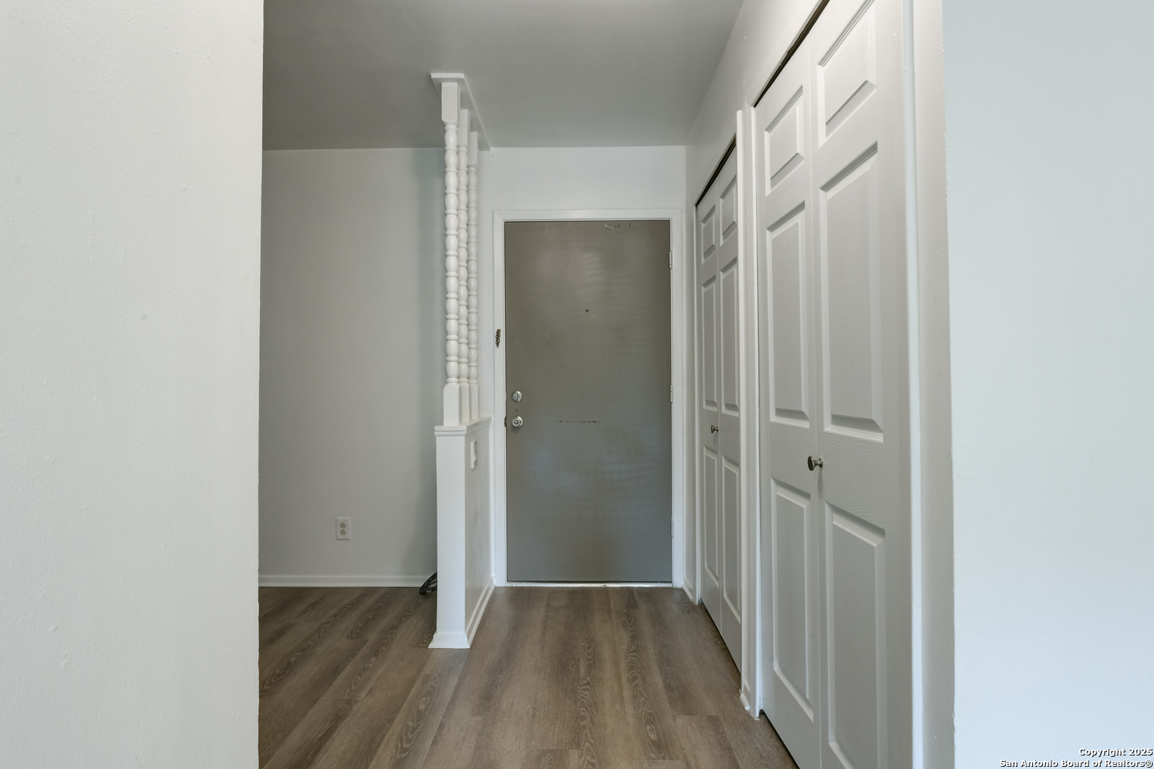 1044 Richmond Drive Schertz, TX 78154 - Photo 2 of 23 a view of a hallway with wooden floor