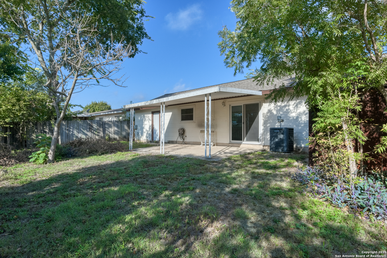 1044 Richmond Drive Schertz, TX 78154 - Photo 22 of 23 a view of a house with a yard