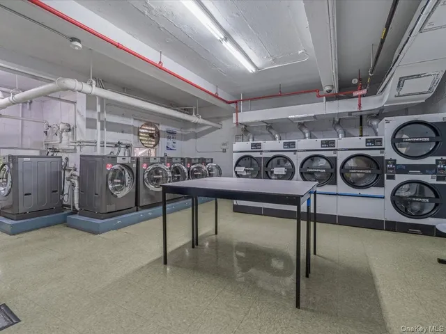 a view of storage and utility room with racks on the wall