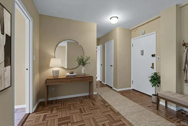 a view of a bathroom with sink and mirror