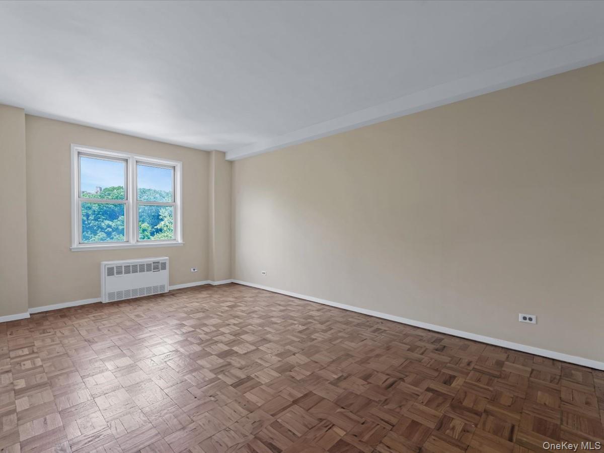 5500 Fieldston Road, Unit 4II Bronx, NY 10471 - Photo 9 of 17 an empty room with windows