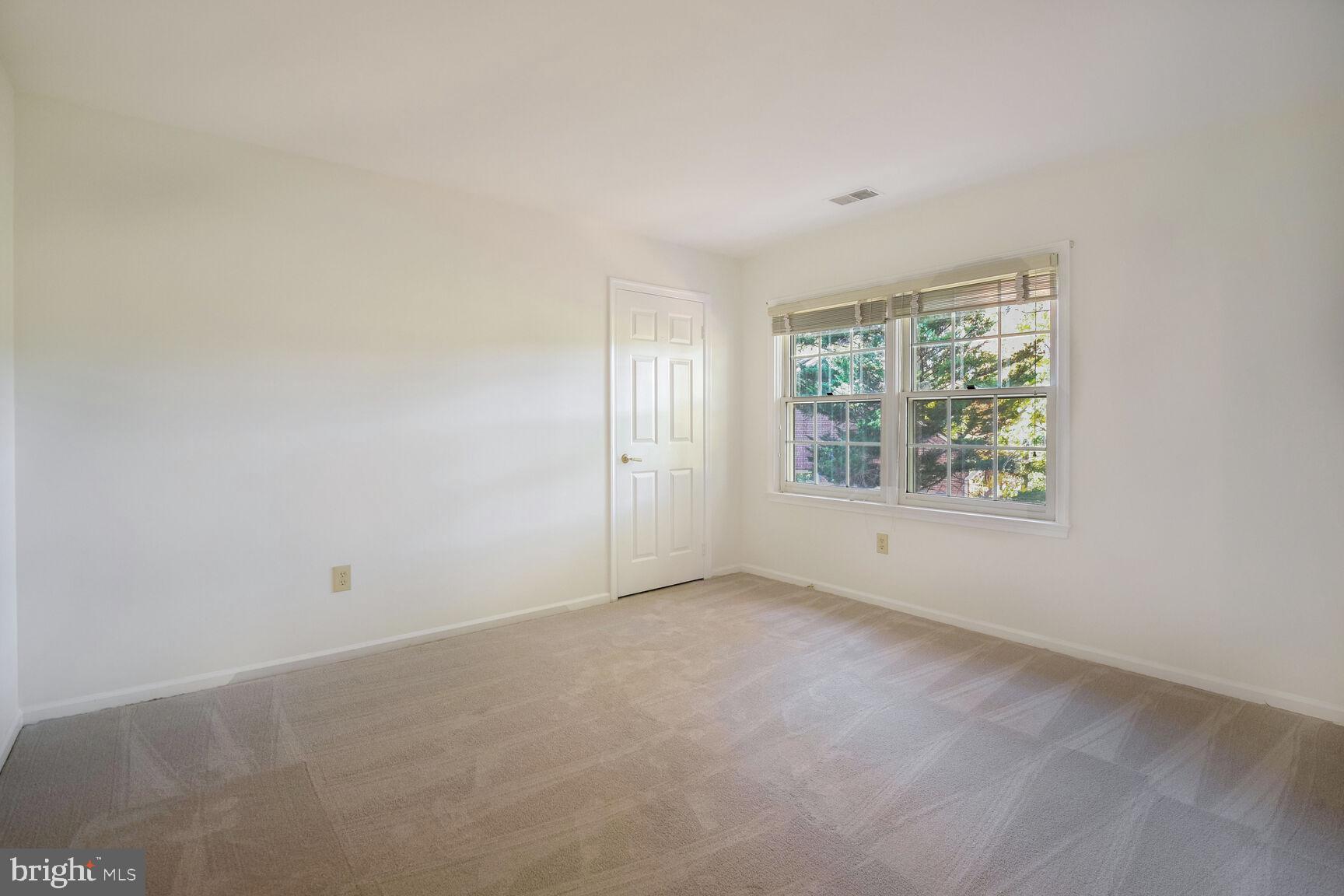 10104 Flower Gate Terrace Potomac, MD 20854 - Photo 25 of 34 an empty room with windows