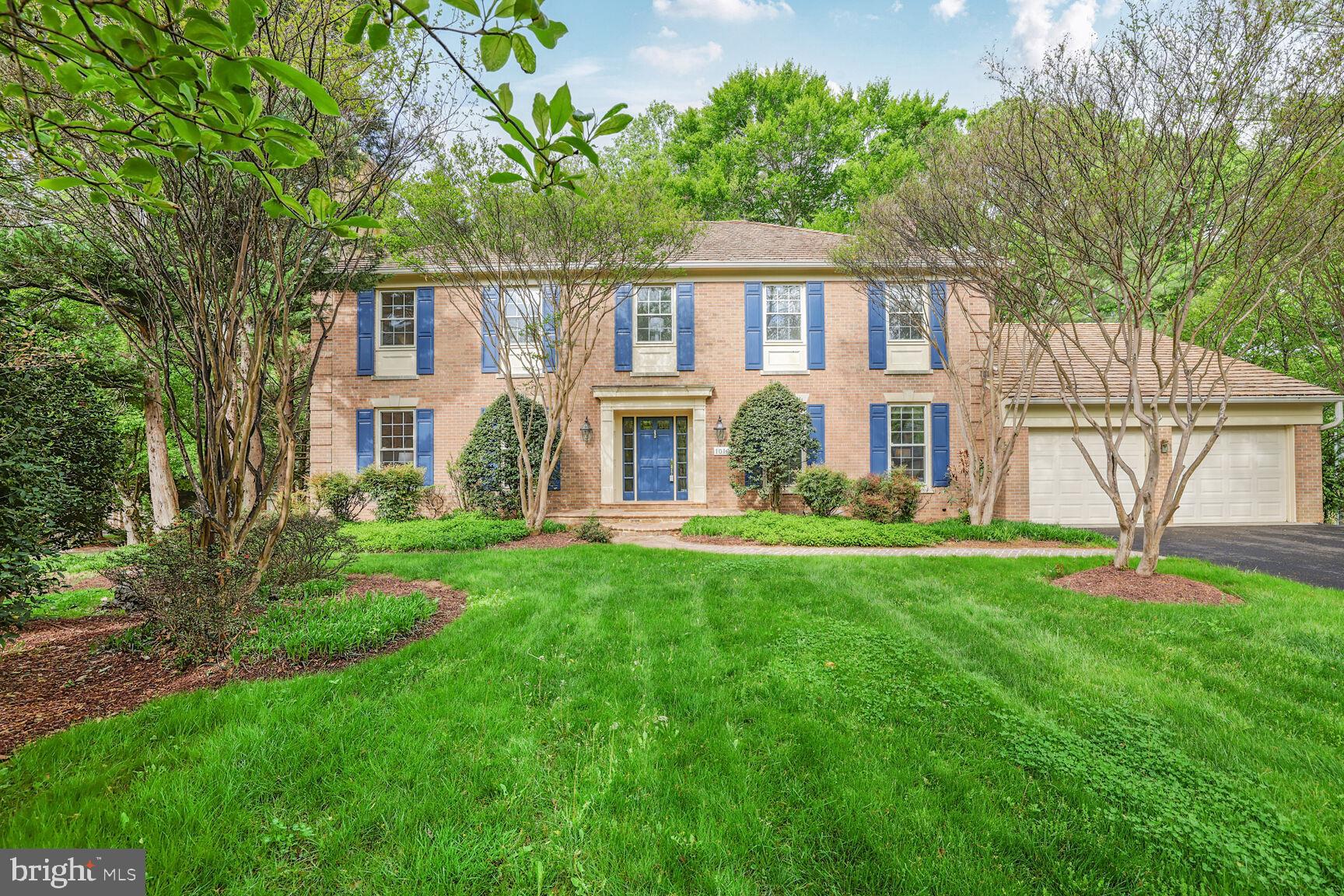 10104 Flower Gate Terrace Potomac, MD 20854 - Photo 3 of 34 a view of a house with backyard and garden