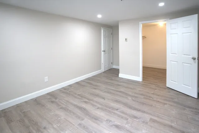 a view of an empty walk in closet
