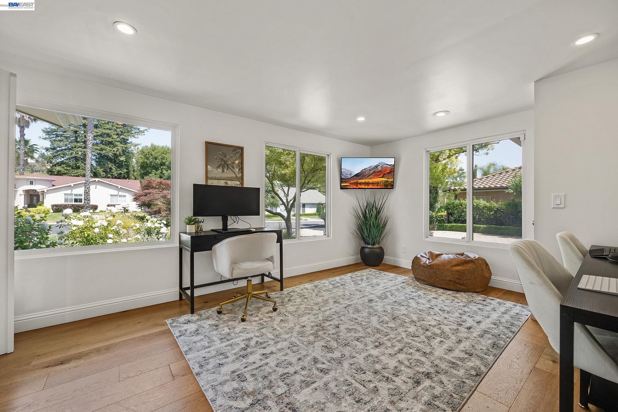 3144 Roundhill Road Alamo, CA 94507 - Photo 17 of 60 a living room with furniture and a window