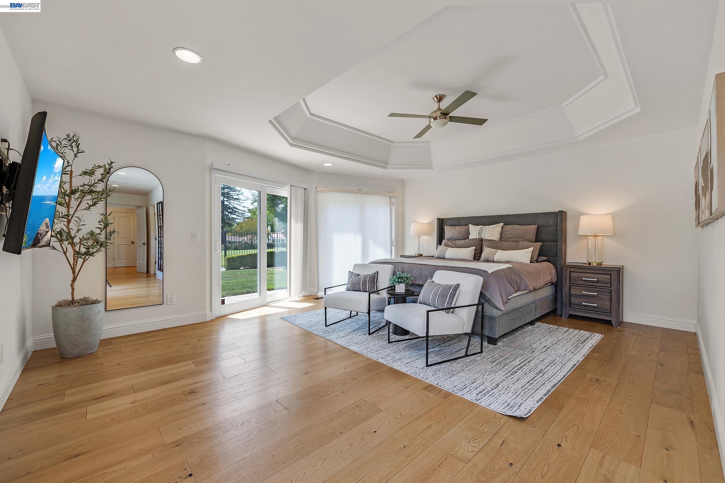 3144 Roundhill Road Alamo, CA 94507 - Photo 25 of 60 a bedroom with furniture and a large window