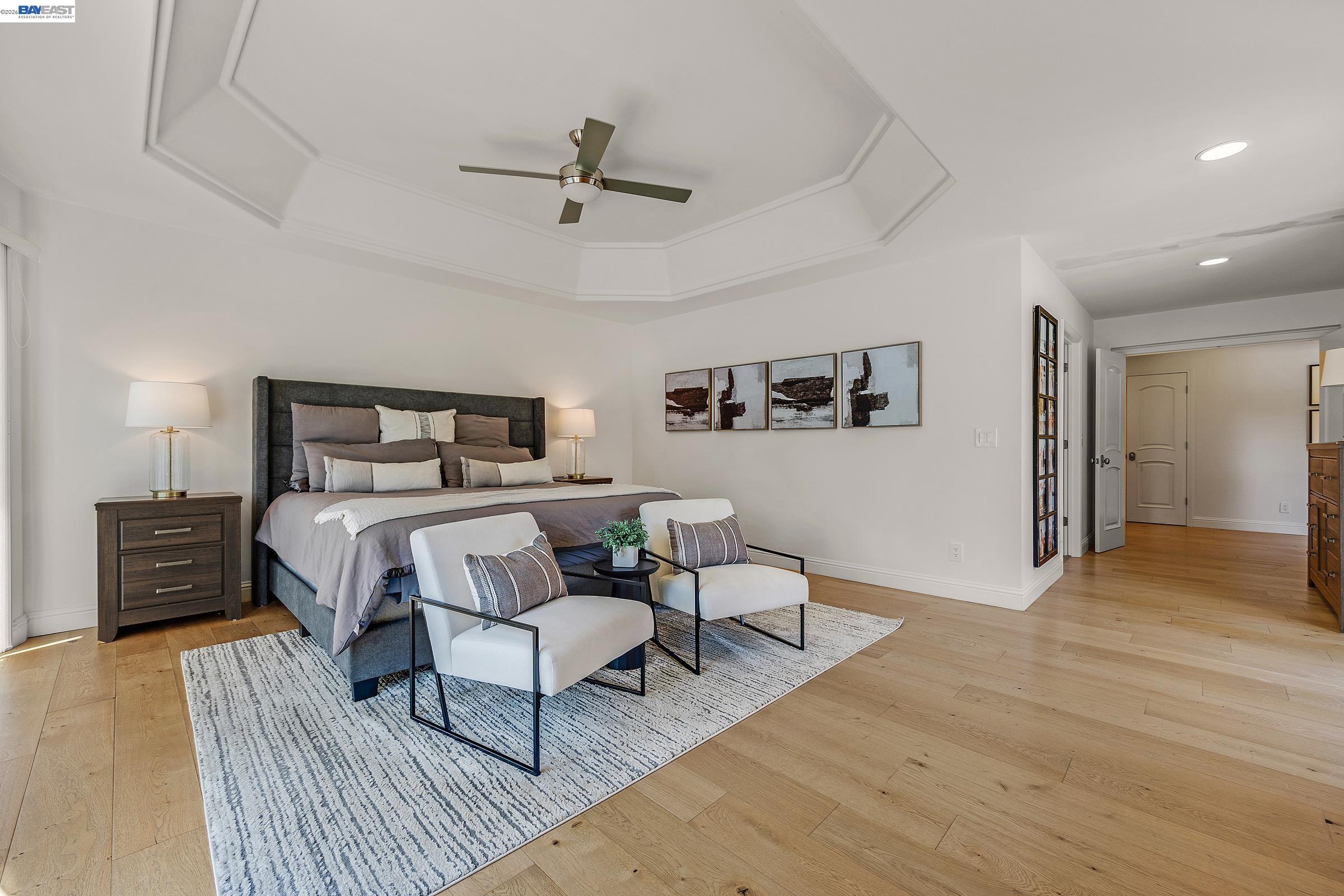3144 Roundhill Road Alamo, CA 94507 - Photo 26 of 60 a bedroom with a bed and wooden floor