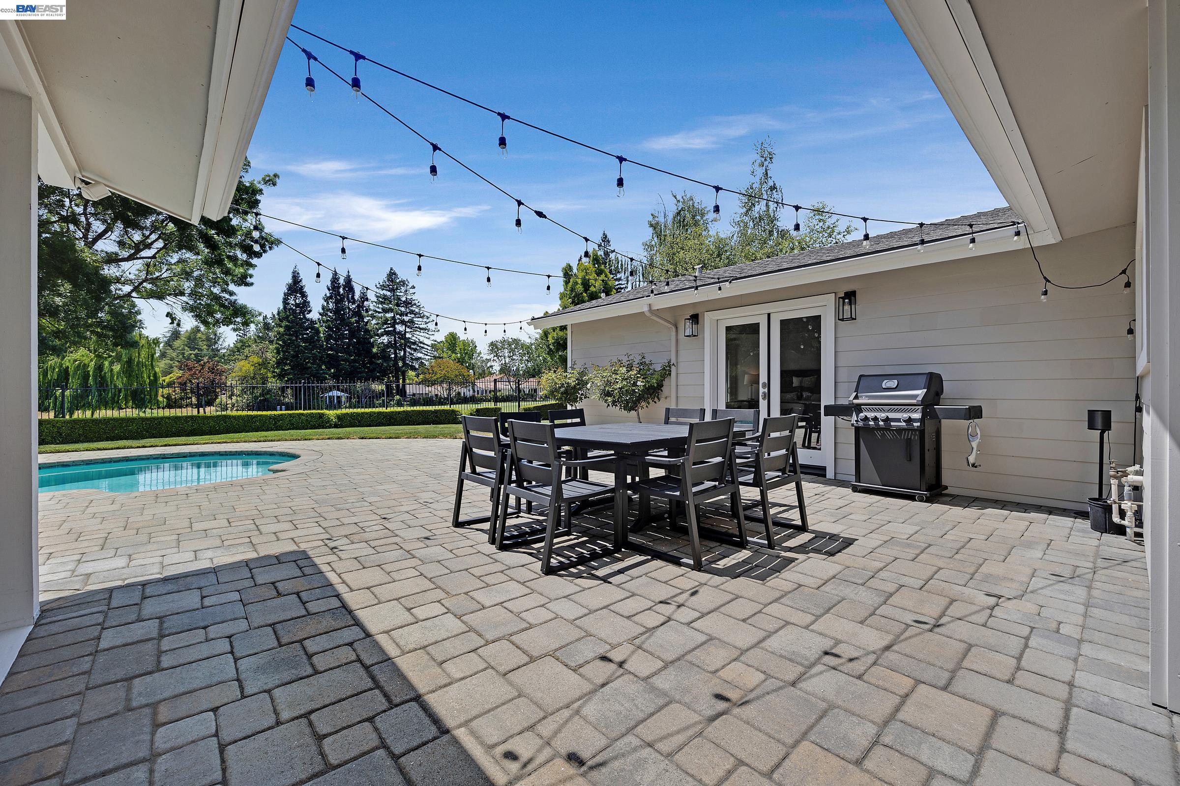 3144 Roundhill Road Alamo, CA 94507 - Photo 45 of 60 a view of a patio with table and chairs