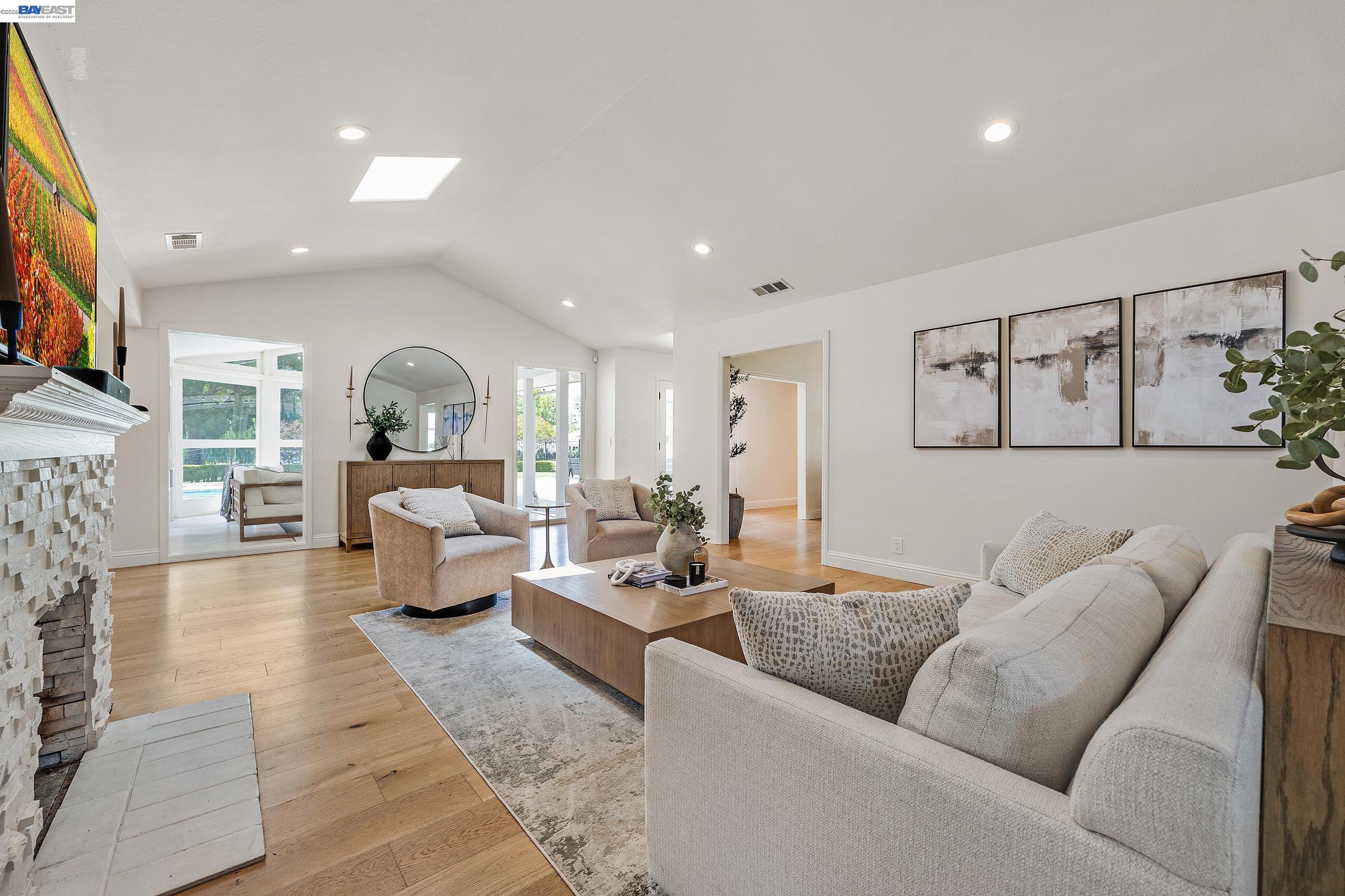 3144 Roundhill Road Alamo, CA 94507 - Photo 6 of 60 a living room with furniture and a wooden floor