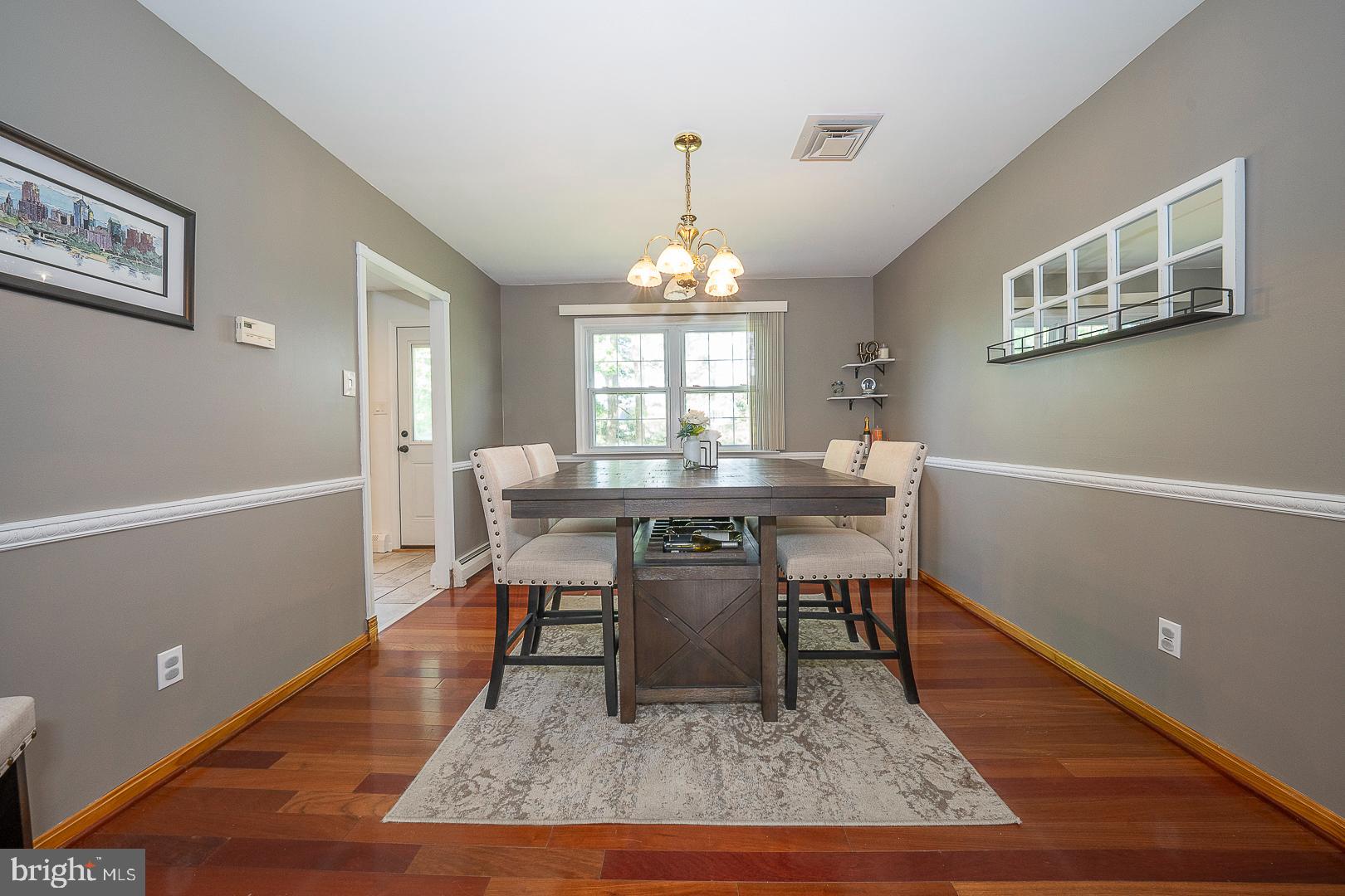 70 Hidden Valley Road Aston, PA 19014 - Photo 11 of 62 a view of a dining room with furniture window and wooden floor