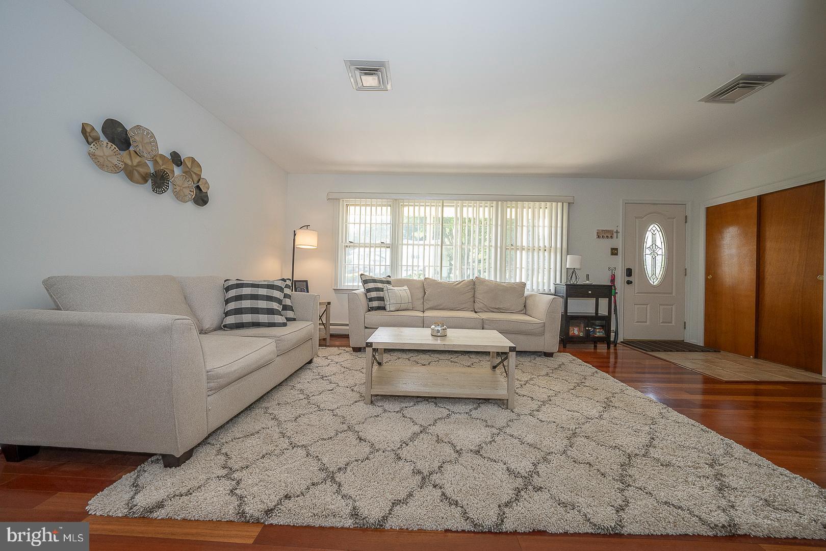 70 Hidden Valley Road Aston, PA 19014 - Photo 12 of 62 a living room with furniture and a rug
