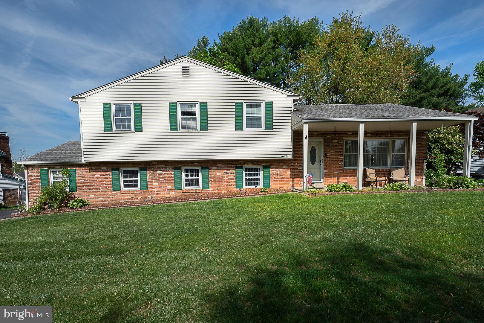 70 Hidden Valley Road Aston, PA 19014 - Photo 2 of 62 a front view of a house with a yard and green space