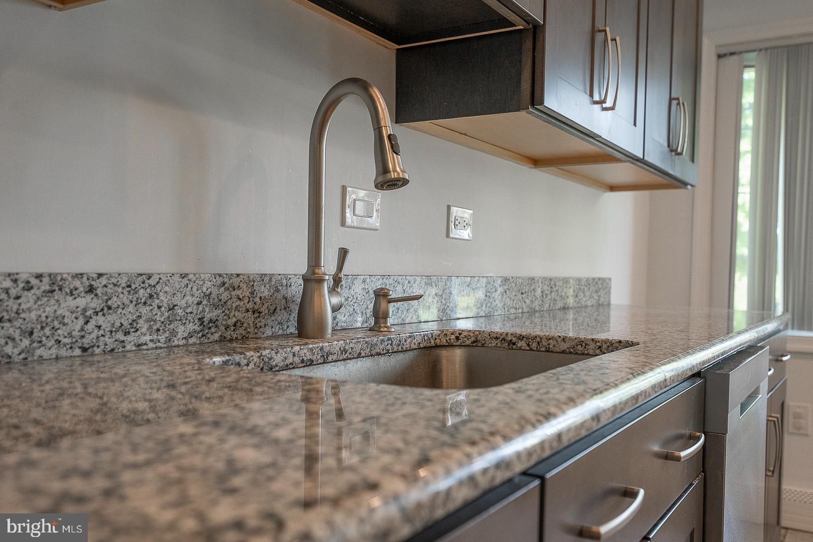 70 Hidden Valley Road Aston, PA 19014 - Photo 21 of 62 a kitchen with a sink and cabinets